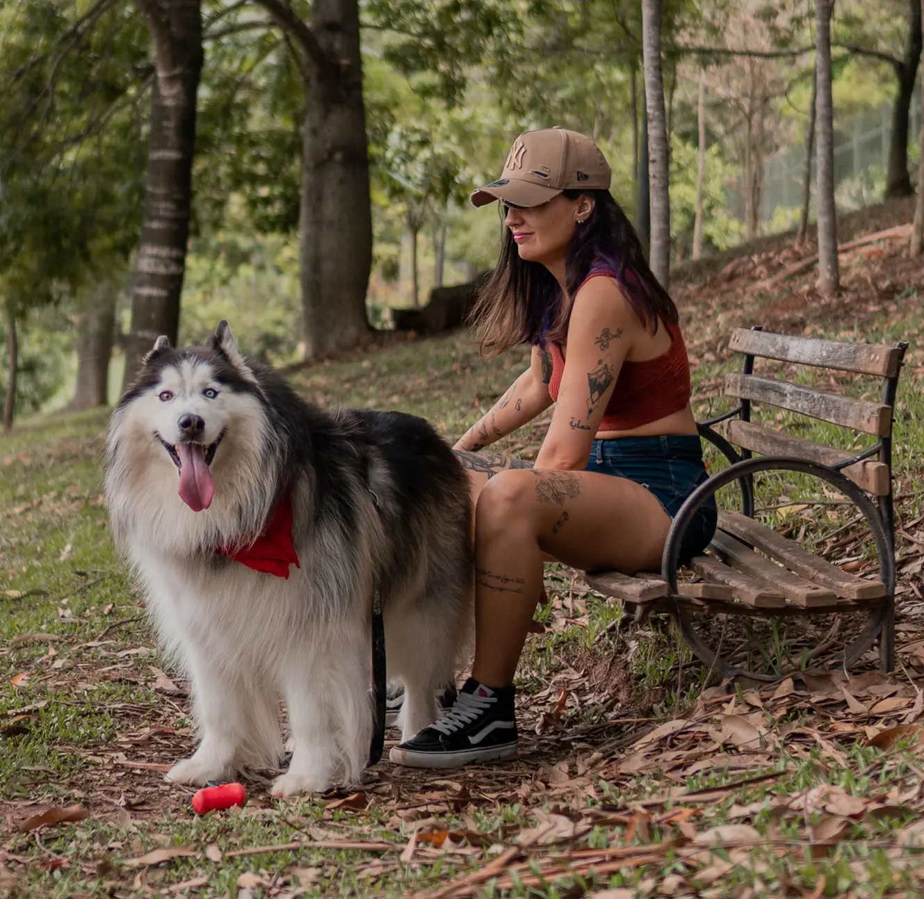 womens social club for dogs outdoor hike waiting with dog on path